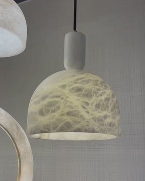 Close-up video of Seren Alabaster pendant light showing natural stone texture and warm glow